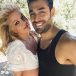 Sam Asghari gets cozy with girlfriend Brooke Irvine while walking dog he bought for ex Britney Spears